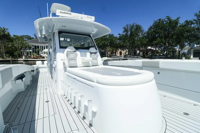 Slide: The Image of Luxurious 2022 Freeman 47 boat cockpit with advanced navigation systems and plush seating. - 24