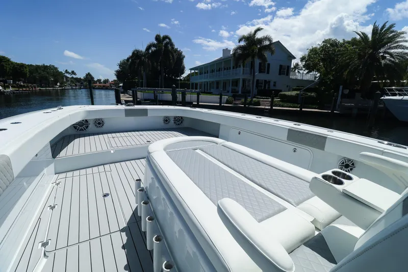 Slide: The Image of Luxurious 2022 Freeman 47 boat interior with advanced navigation system and plush seating. - 26