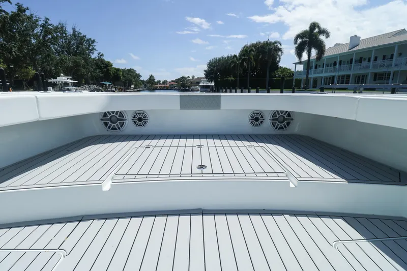 Slide: The Image of 2022 Freeman 47 boat with sleek white deck and modern seating. - 30