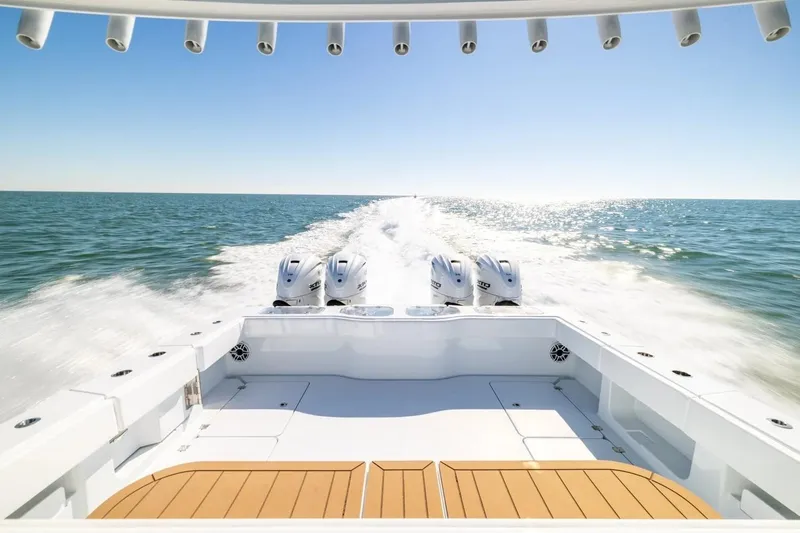 Slide: The Image of 2022 Freeman 47 boat cruising on open sea with powerful engines. - 4