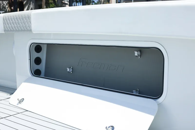 Slide: The Image of Control panel of a 2022 Freeman 47 boat with navigation and communication systems. - 42