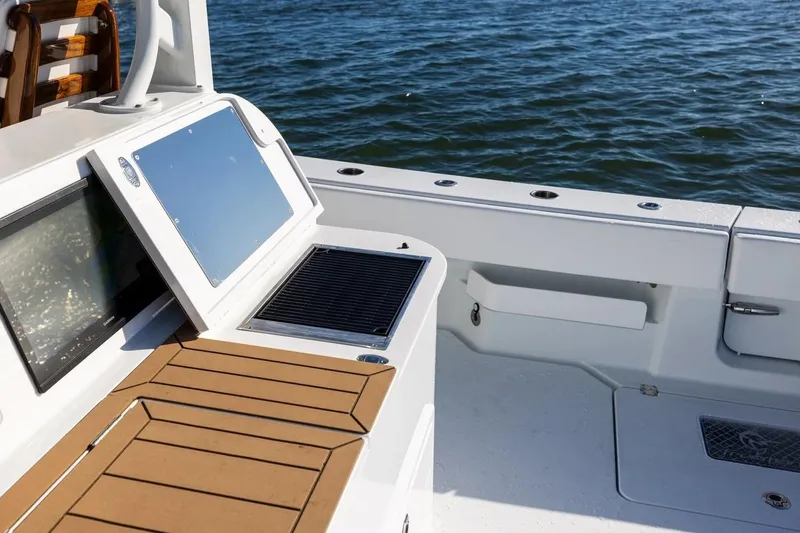 Slide: The Image of 2022 Freeman 47 boat deck with control panel and ocean view. - 5