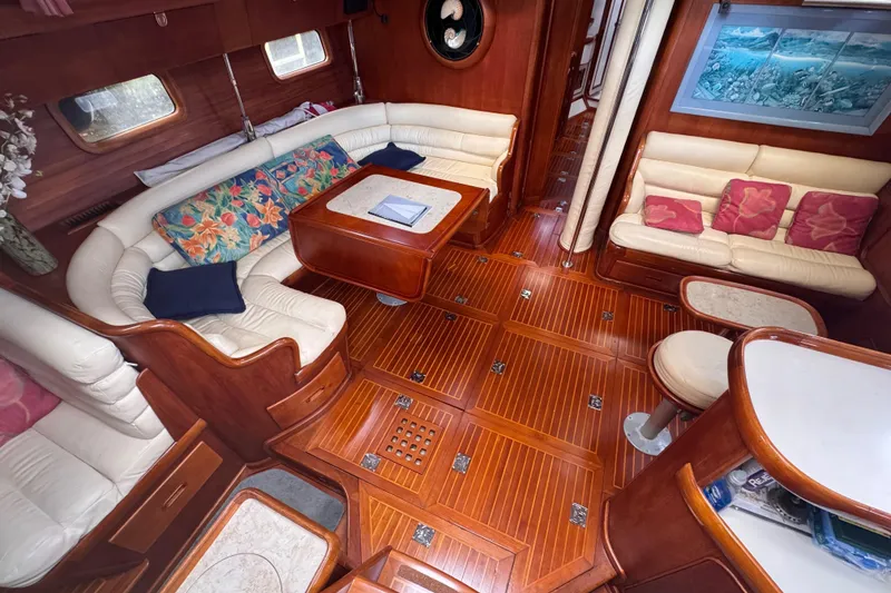 Slide: The Image of Luxurious 1989 Little Harbor Sloop interior with elegant wood finish and plush seating. - 46