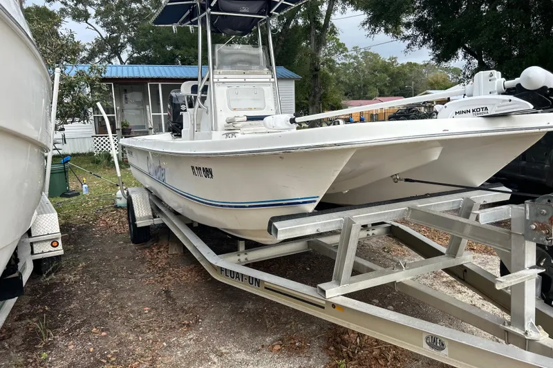 Slide: The Image of 2017 Twin Vee 22 BayCat boat on trailer, parked outdoors. - 3