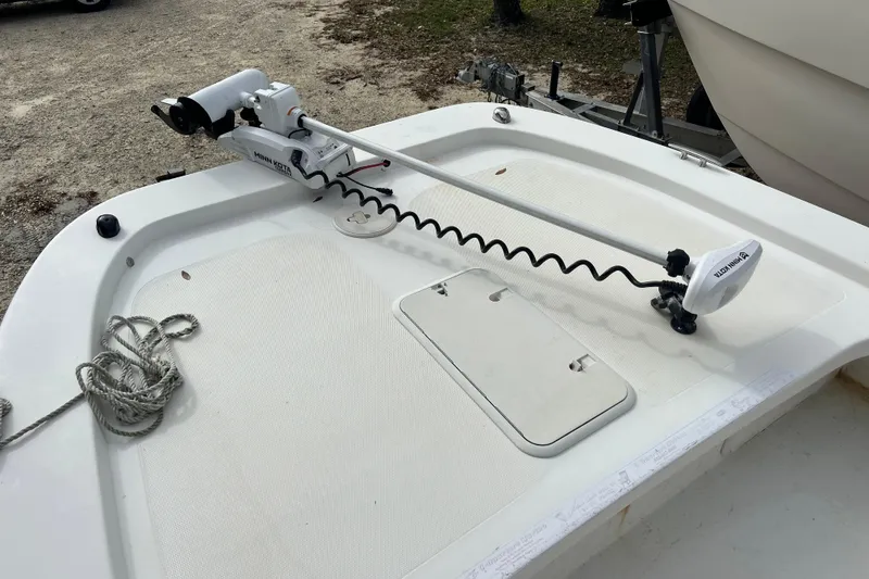 Slide: The Image of 2017 Twin Vee 22 BayCat boat with Minn Kota trolling motor on deck. - 6