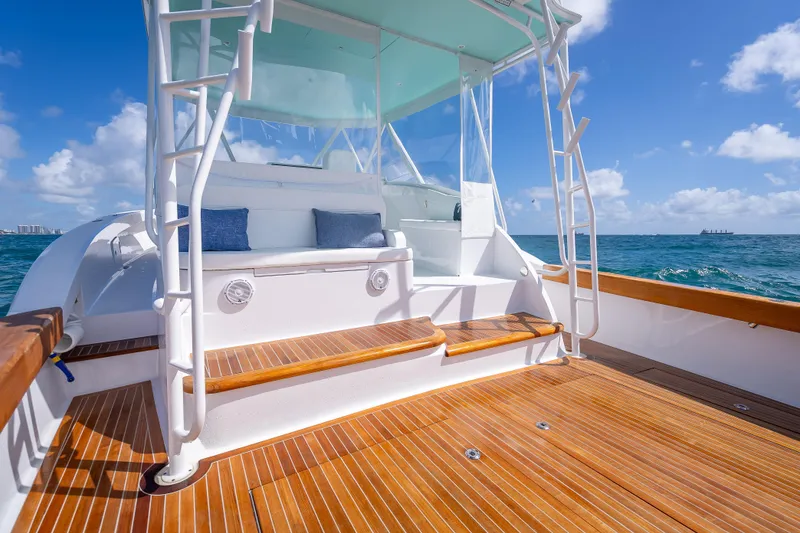 Slide: The Image of Luxurious Custom Margaritavich 2025 yacht deck with seating, ocean view, and clear skies. - 13