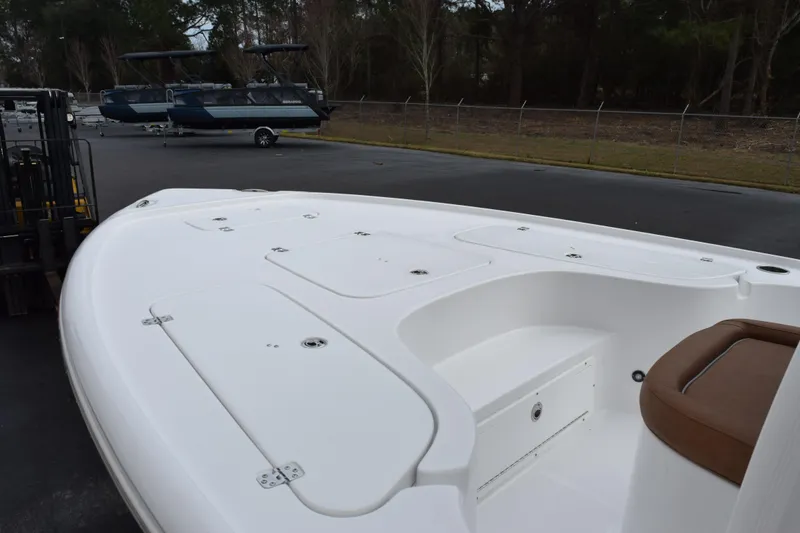 Slide: The Image of 2026 Sea Hunt BX 22 BR boat with spacious deck and seating area. - 14