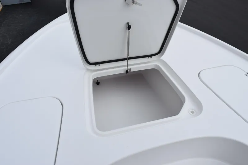 Slide: The Image of Open storage compartment on 2026 Sea Hunt BX 22 BR boat deck. - 19