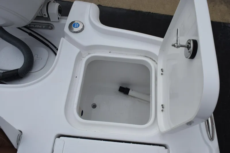 Slide: The Image of Open storage compartment on 2026 Sea Hunt BX 22 BR boat. - 21