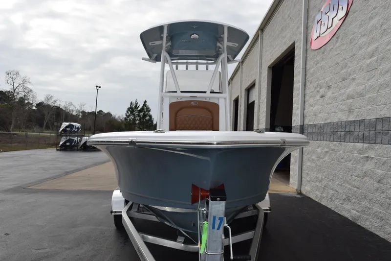 Slide: The Image of 2026 Sea Hunt BX 22 BR boat on trailer outside a building. - 3