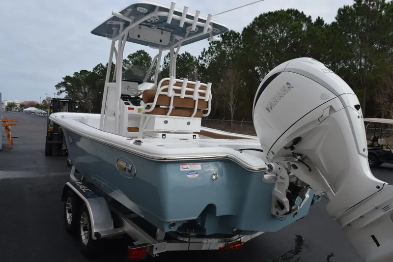 Slide: The Image of 2026 Sea Hunt BX 22 BR boat with Yamaha outboard motor on trailer. - 6