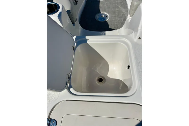 Slide: The Image of Open storage compartment on 2018 Starcraft 2000 OB Limited boat. - 17
