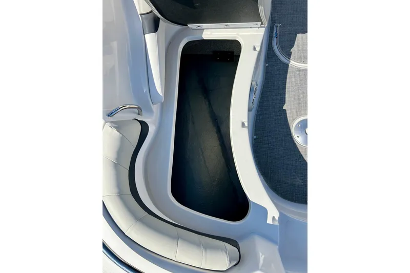 Slide: The Image of 2018 Starcraft 2000 OB Limited boat interior with seating and storage compartment. - 20
