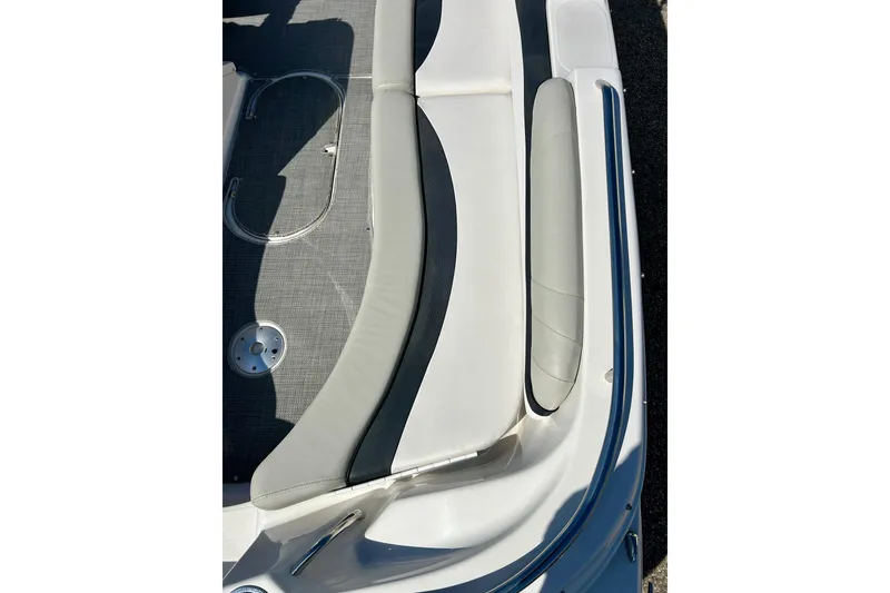 Slide: The Image of 2018 Starcraft 2000 OB Limited boat interior with gray seating and flooring. - 21