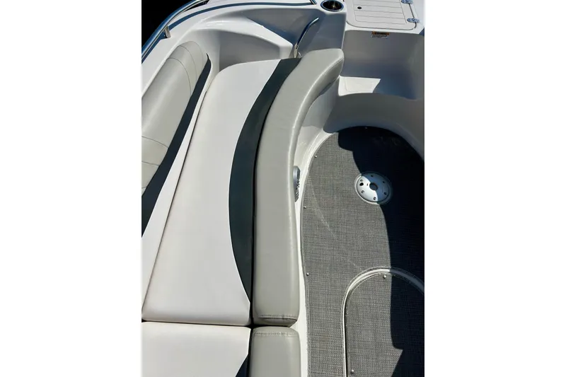 Slide: The Image of 2018 Starcraft 2000 OB Limited boat interior with cushioned seating and carpeted floor. - 22