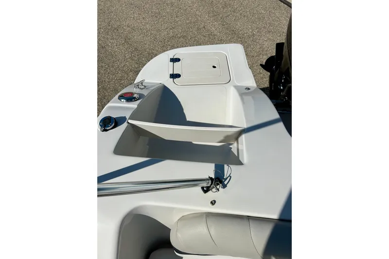 Slide: The Image of 2018 Starcraft 2000 OB Limited boat deck with storage compartment and seating. - 32