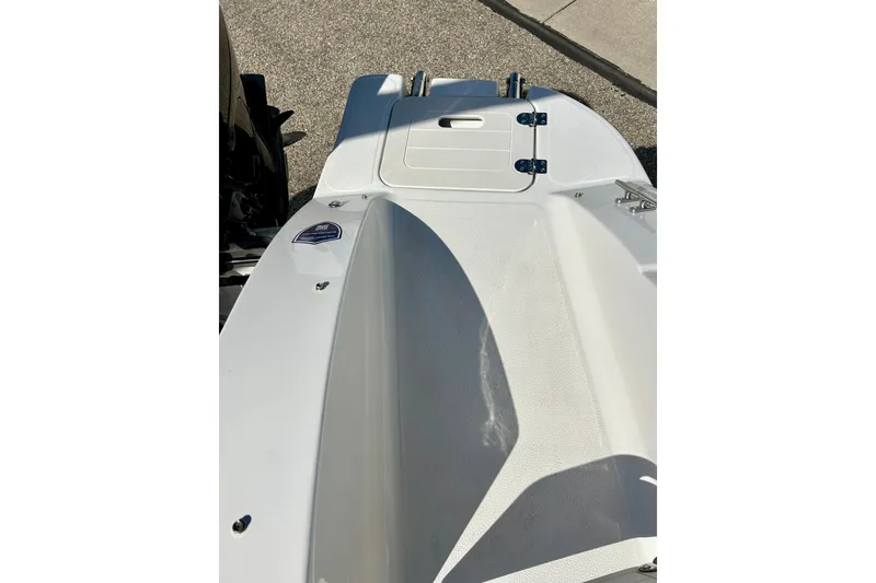 Slide: The Image of 2018 Starcraft 2000 OB Limited boat deck with storage compartment. - 33