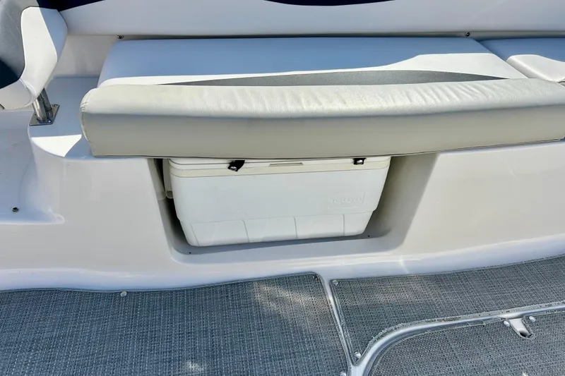 Slide: The Image of 2018 Starcraft 2000 OB Limited boat seat with integrated cooler storage. - 52