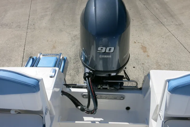 Slide: The Image of 2026 Robalo R160 Center Console with Yamaha 90 outboard motor, rear view. - 18