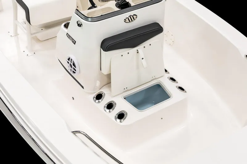 Slide: The Image of 2026 Robalo R160 Center Console boat with Yamaha outboard motor, parked outdoors. - 4