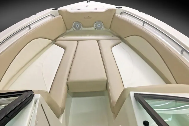 Slide: The Image of Manufacturer Provided Image: 2018 NauticStar 2302 Legacy Dual Console boat interior with beige seating. - 7