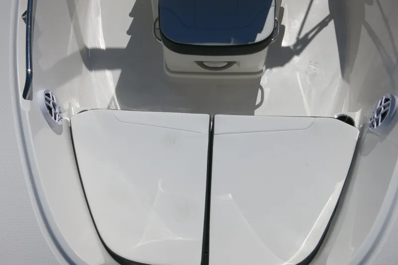 Slide: The Image of 2026 Robalo R180 Center Console boat interior with seating and storage compartments. - 15
