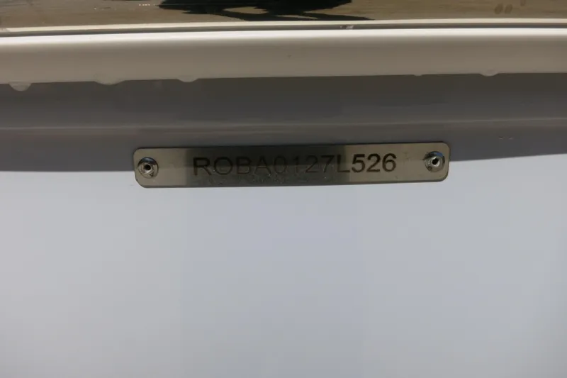 Slide: The Image of 2026 Robalo R180 Center Console boat identification plate with serial number. - 22