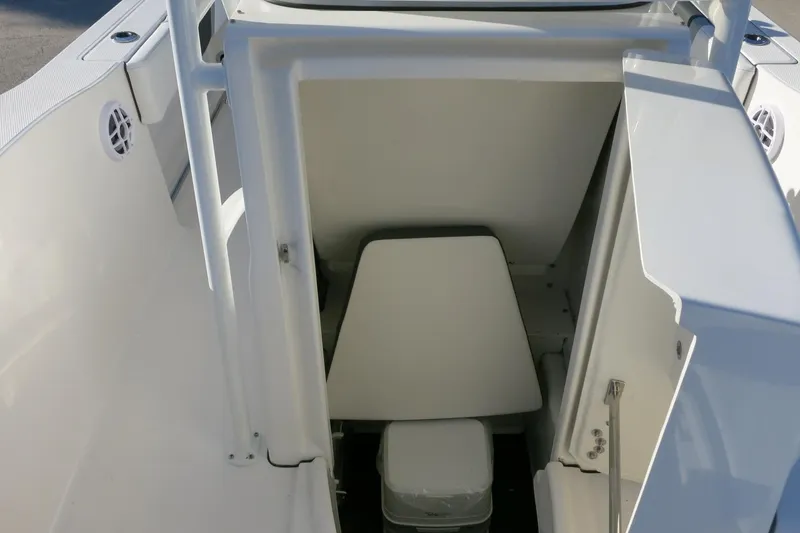 Slide: The Image of 2026 Robalo R200 Center Console boat interior storage compartment. - 22