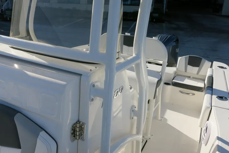 Slide: The Image of 2026 Robalo R200 Center Console boat interior with seating and console details. - 24