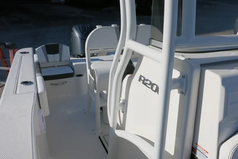 Slide: The Image of 2026 Robalo R200 Center Console boat interior with seating and console details. - 25