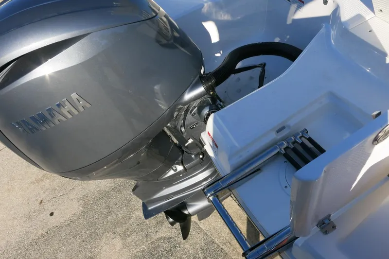 Slide: The Image of 2026 Robalo R200 Center Console with Yamaha outboard motor and swim ladder. - 26