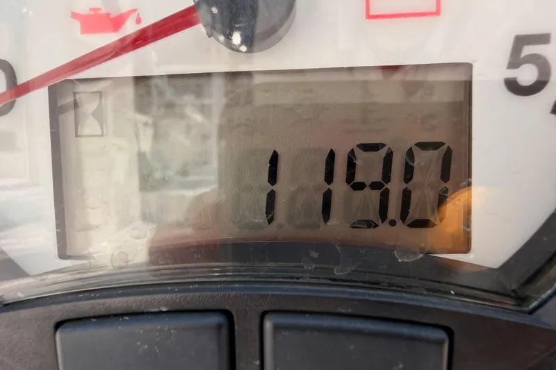 Slide: The Image of Close-up of a Beneteau First 36 2023 engine hour meter displaying 119.0 hours. - 16