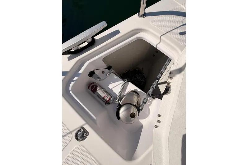 Slide: The Image of Anchor locker of 2023 Beneteau First 36 sailboat with chain and winch. - 29