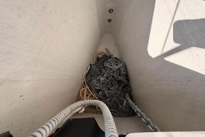 Slide: The Image of Anchor chain storage on 2023 Beneteau First 36 sailboat. - 30