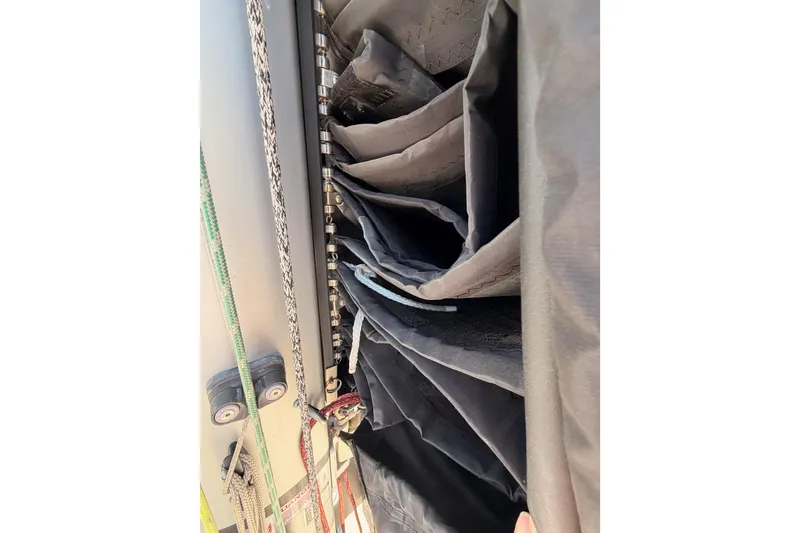 Slide: The Image of Close-up of 2023 Beneteau First 36 sailboat rigging and sail details. - 35