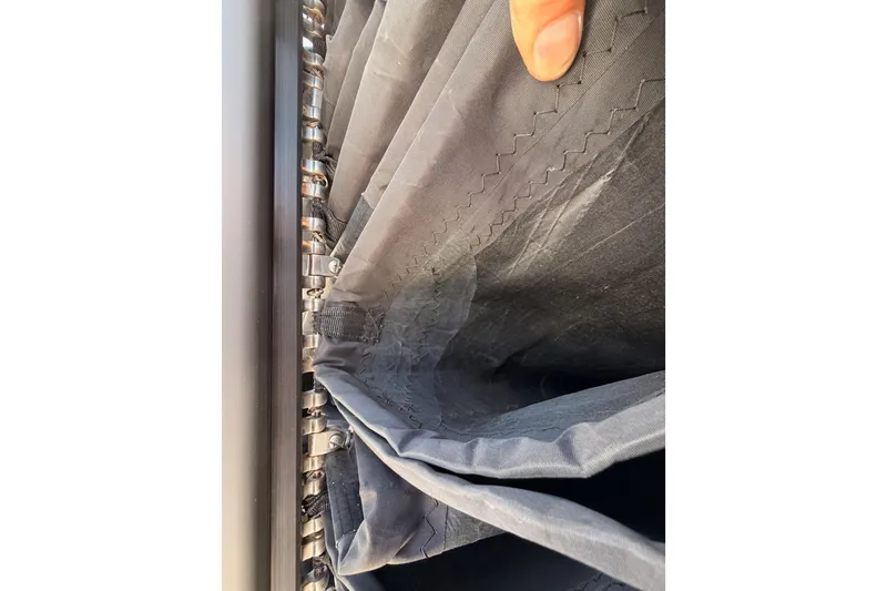 Slide: The Image of Close-up of sail stitching on 2023 Beneteau First 36 yacht. - 36