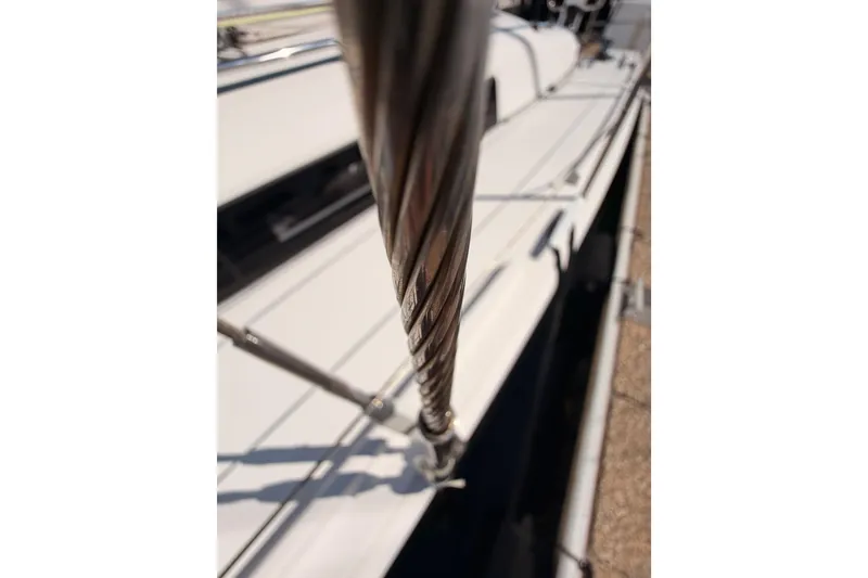 Slide: The Image of Close-up of a 2023 Beneteau First 36 sailboat's rigging and deck. - 37