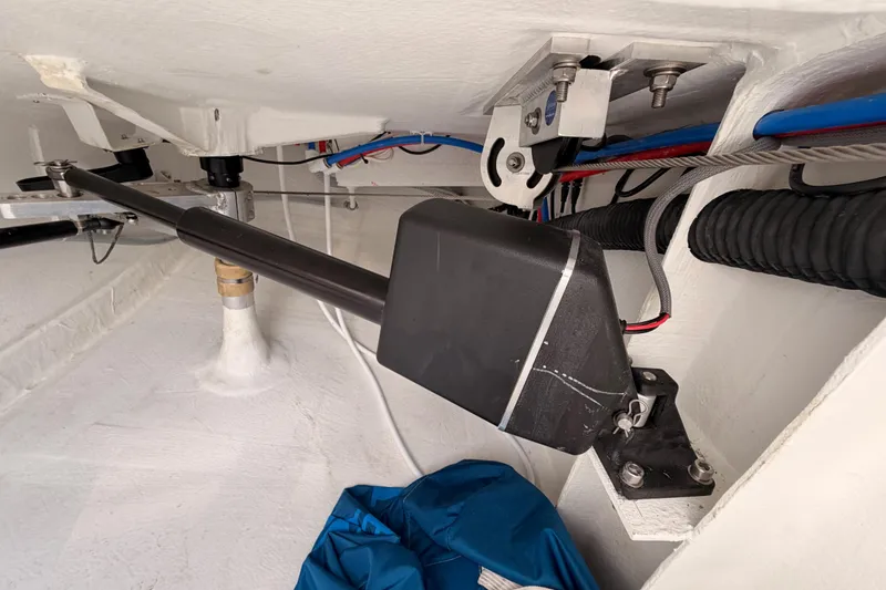 Slide: The Image of Interior view of 2023 Beneteau First 36 sailboat, showcasing mechanical components and wiring. - 42