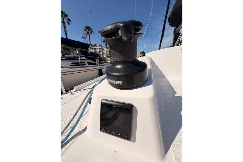 Slide: The Image of 2023 Beneteau First 36 sailboat deck with Harken winch and Garmin display. - 46