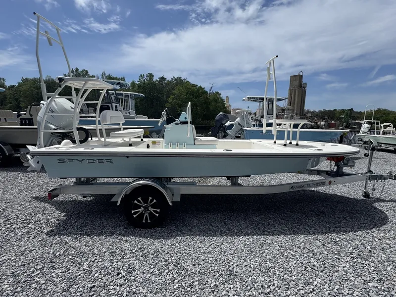 The Image of 2026 Spyder FX17 Flicker boat on trailer outdoors. - 1