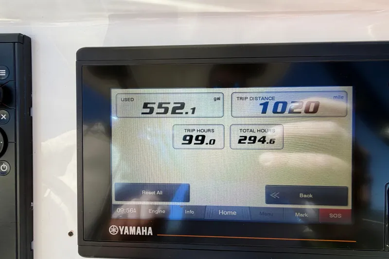 Slide: The Image of Yamaha display showing fuel usage and trip data for 2019 Everglades 243 Center Console. - 13