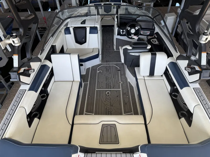 Slide: The Image of Interior of a 2018 Nautique G23 boat with luxurious seating. - 4