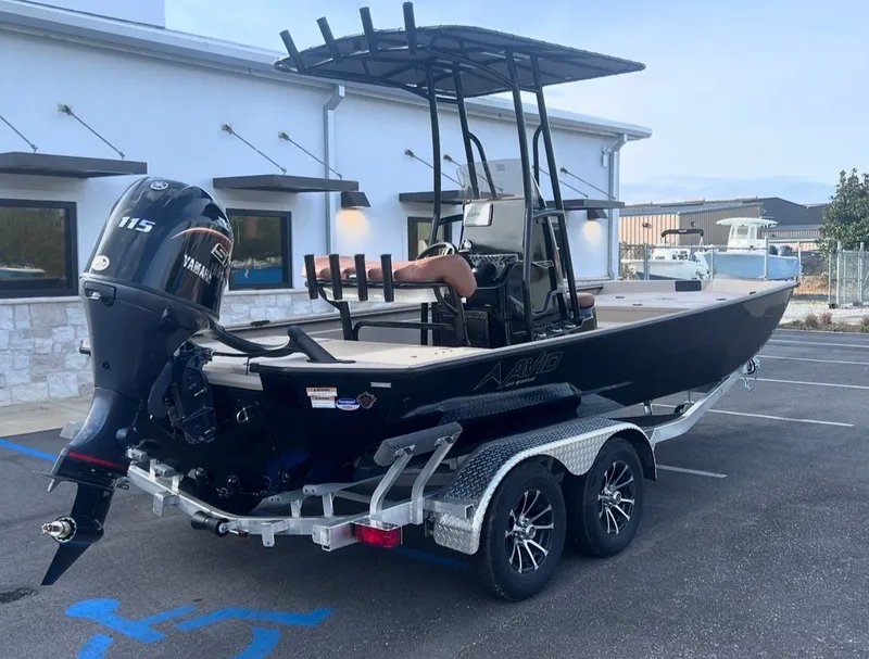 Slide: The Image of Avid 20CC Rogue 2026 on trailer with Yamaha 115 outboard motor. - 3