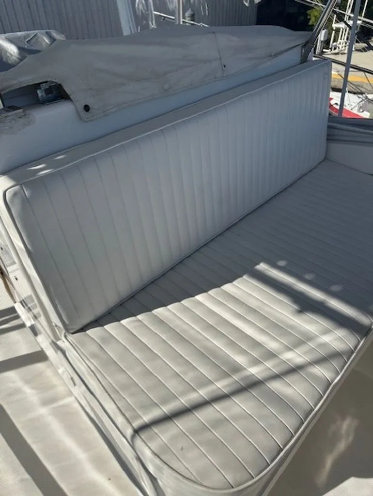 Slide: The Image of White seating on a 2005 Luhrs 33 Convertible boat. - 10