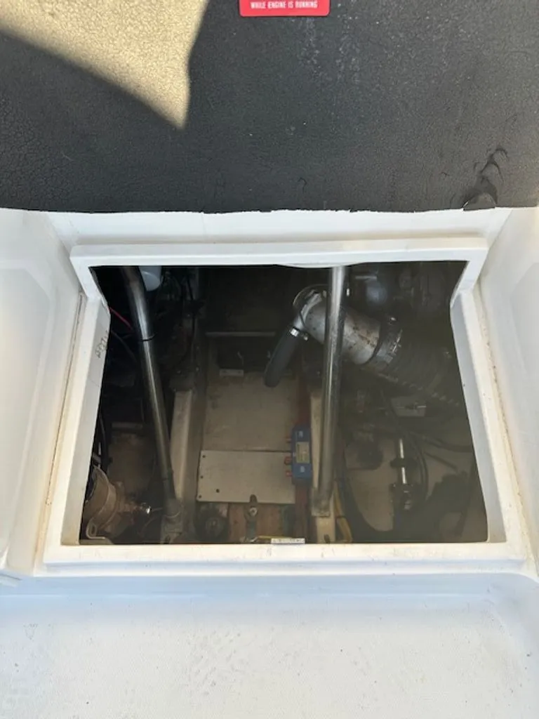 Slide: The Image of Engine compartment of a 2005 Luhrs 33 Convertible boat. - 15