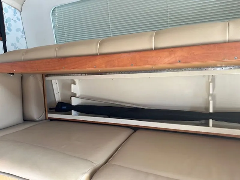 Slide: The Image of Interior of 2005 Luhrs 33 Convertible with storage under seat. - 22