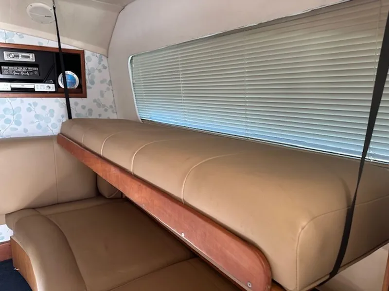 Slide: The Image of Interior of 2005 Luhrs 33 Convertible with seating area. - 23