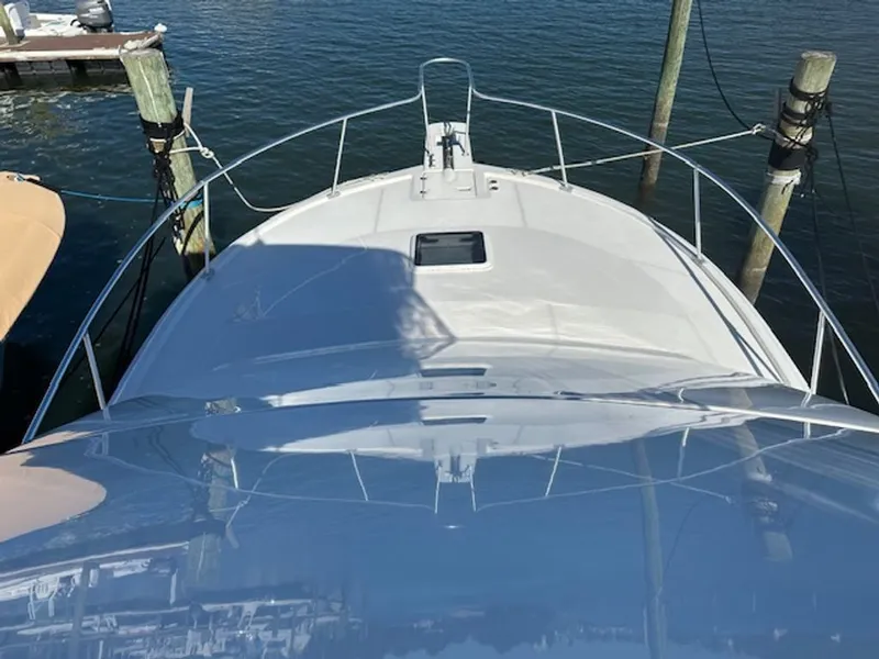 Slide: The Image of Foredeck of a 2005 Luhrs 33 Convertible yacht at dock. - 36