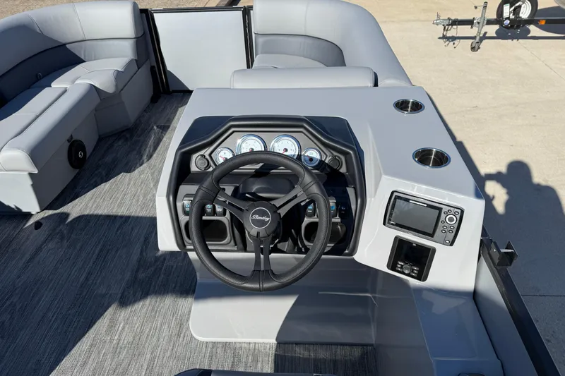 Slide: The Image of 2026 Bentley Pontoons Legacy 200 Cruise XL dashboard with steering wheel and controls. - 16