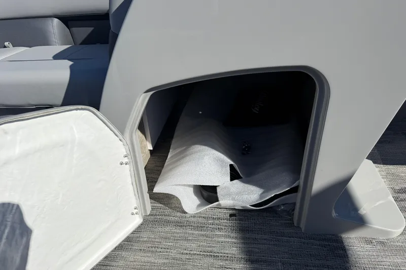 Slide: The Image of 2026 Bentley Pontoons Legacy 200 Cruise XL storage compartment with open hatch. - 17